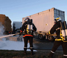 Fire brigade in action during a radioactive material transport accident exercise &copy;&nbsp;AREVA/JM.&nbsp;Taillat